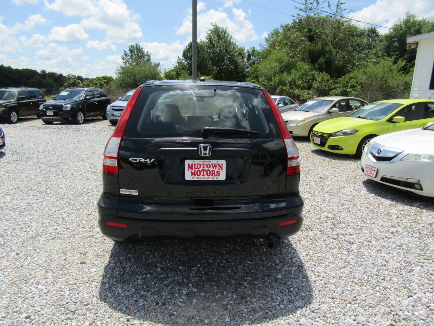 2009 Black /Gray Honda CR-V LX 2WD 5-Speed AT (5J6RE38369L) with an 2.4L L4 DOHC 16V engine, Automatic transmission, located at 15016 S Hwy 231, Midland City, AL, 36350, (334) 983-3001, 31.306210, -85.495277 - Photo#6